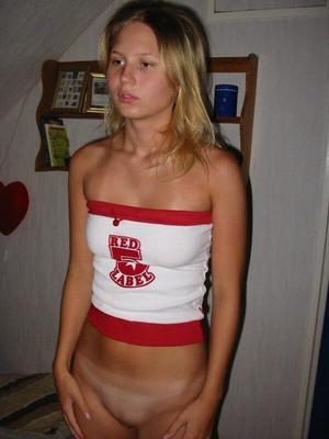 Petite young blonde poser