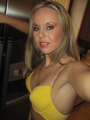 Classy blonde teen posing