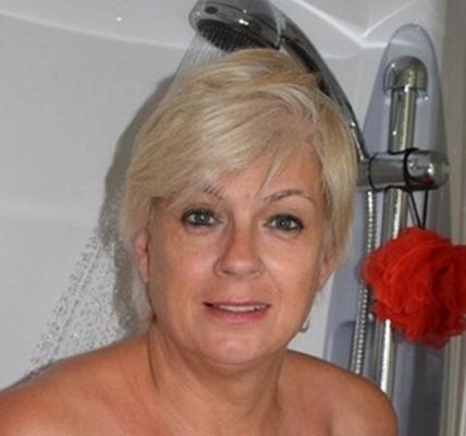 Nasty blond MILF showering