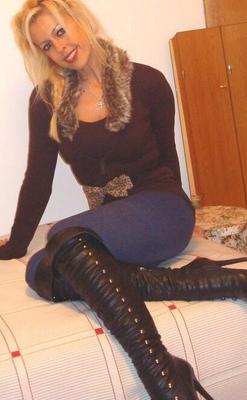 Trashy Euro MILF in boots, leggings, tights