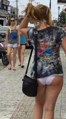 Dressed only in PANTIES and short SHIRT in public street flashin