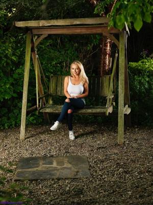 Blonde Beauty Barefoot Outdoors in Jeans