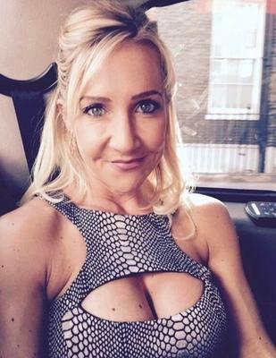 Fit Blonde Mature Shows Her Fake Tits