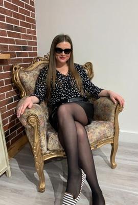 Gorgeous legs in Russian wife&#;s black pantyhose