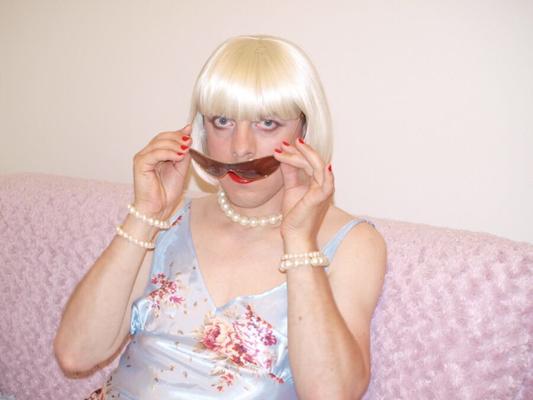 Blond slut crossdresser shows luscious lips