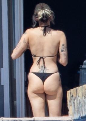 Miley Cyrus in a tiny black thong