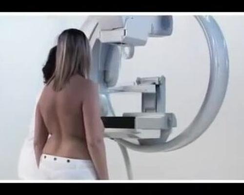 Young blonde woman having a mammogram