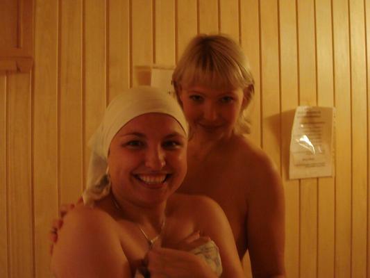 Cute blonde girl in sauna