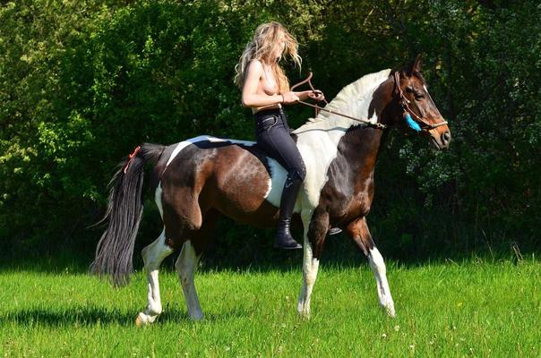 Topless Horse Riding Blonde